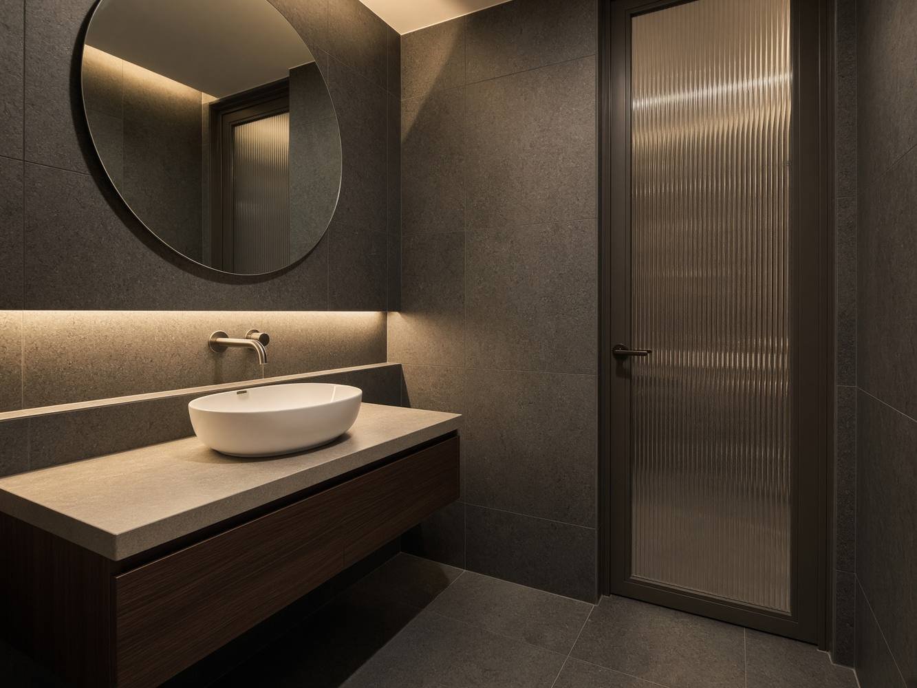 Singapore condominium powder room with round mirror and warm lighting